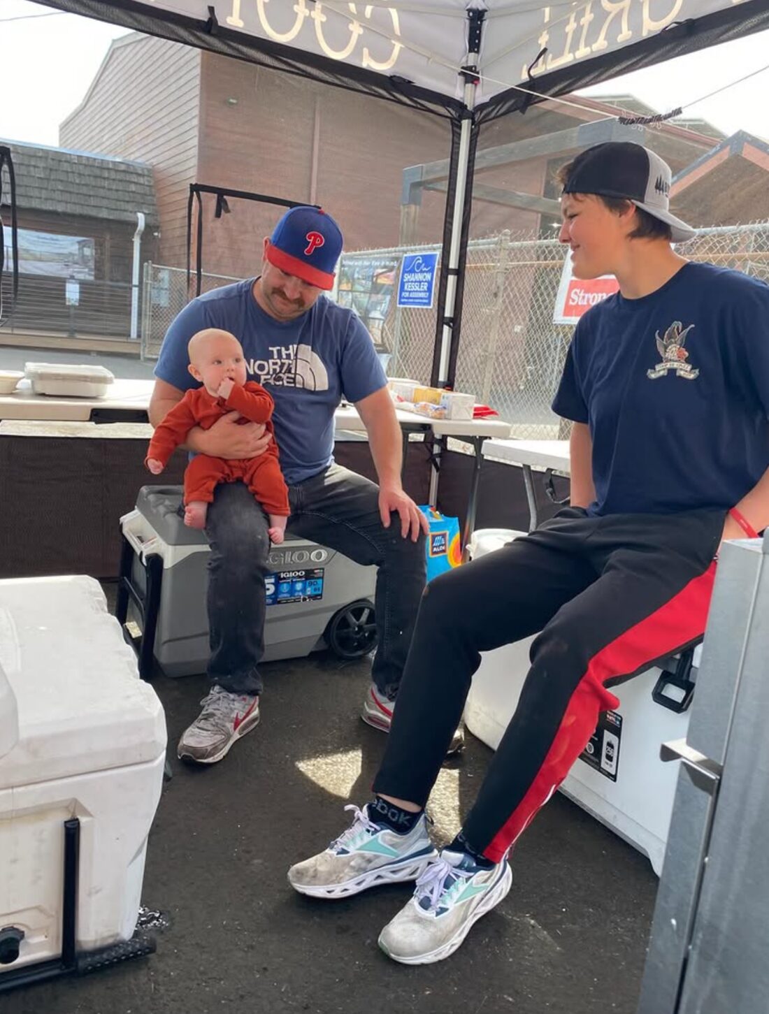 Cole and family at the catering booth